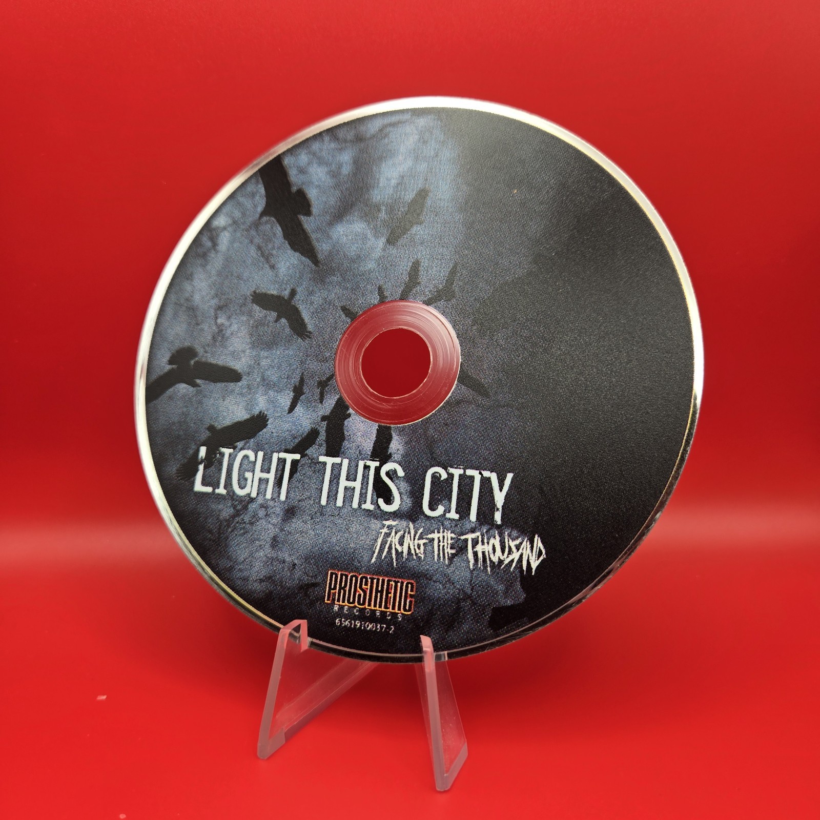 LIGHT THIS CITY FACING THE THOUSAND CD Death Metal