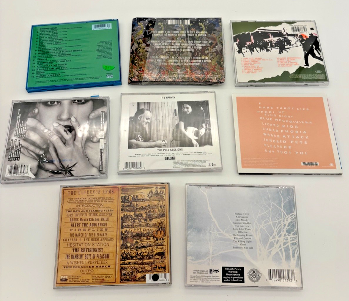 Lot of 8 CDs - used - AFI - PJ HARVEY - CLASH - KATE BUSH