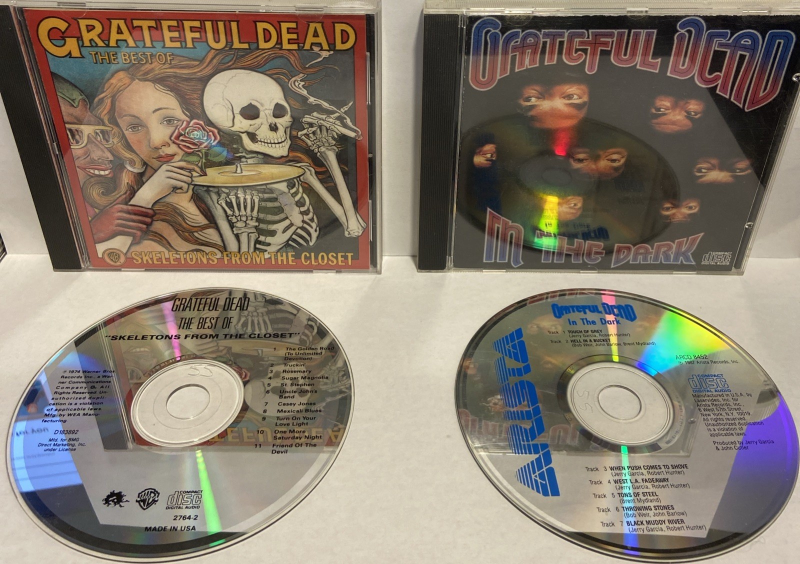 Grateful Dead CD Lot of 2 – ”In The Dark”, “ Skeletons From The Closet”