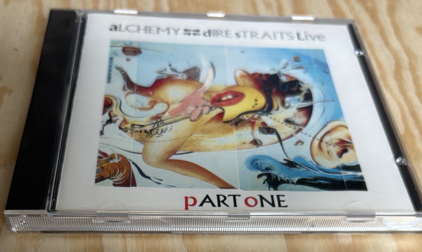Dire Straits –Alchemy Live (D1)–Vertigo 818 244‑2 West Germany Red Fan Pressing