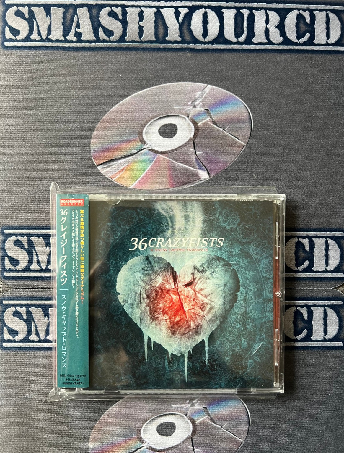 36 CRAZYFISTS - A SNOW CAPPED ROMANCE(JAPAN IMPORT/+ OBI STRIP/+ 2 EXTRA TRACKS)
