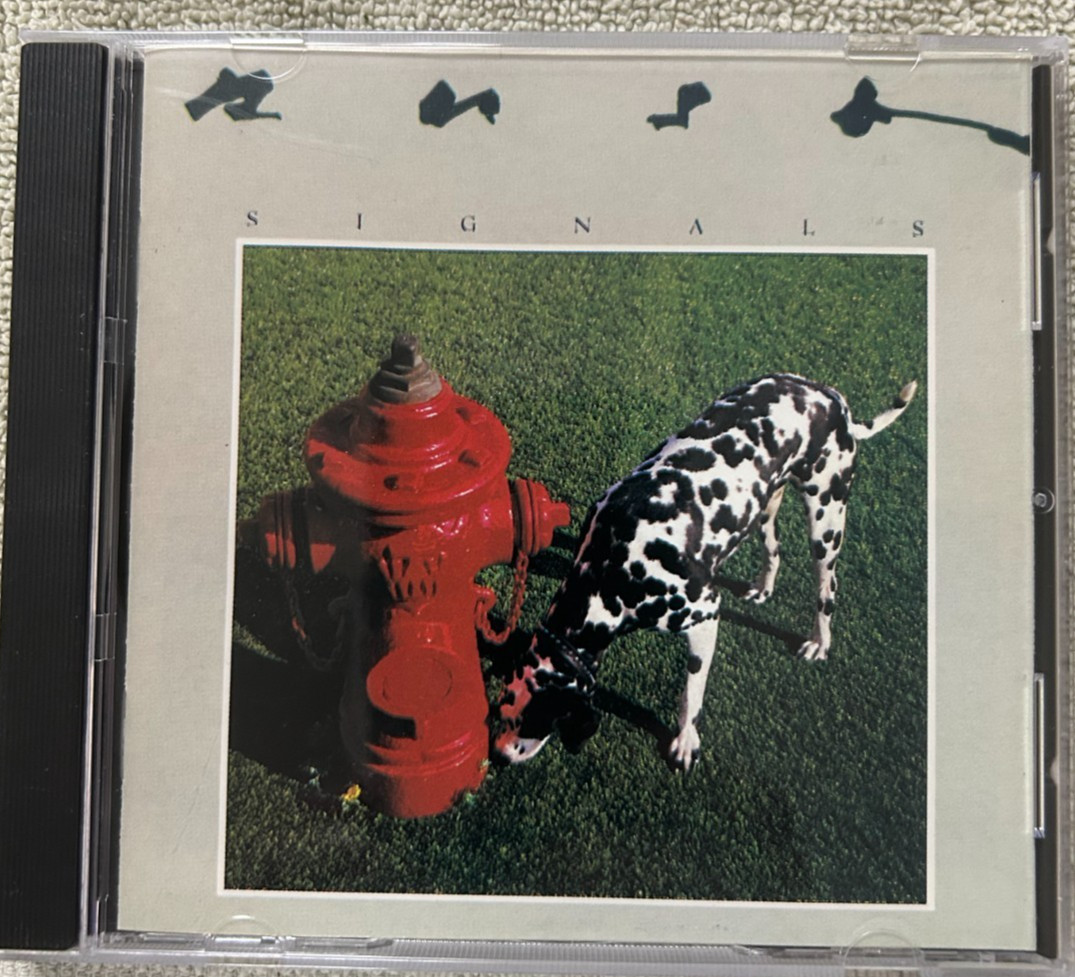 Rush "Signals " CD: Island/Mercury 810 002-2. One Day Handling