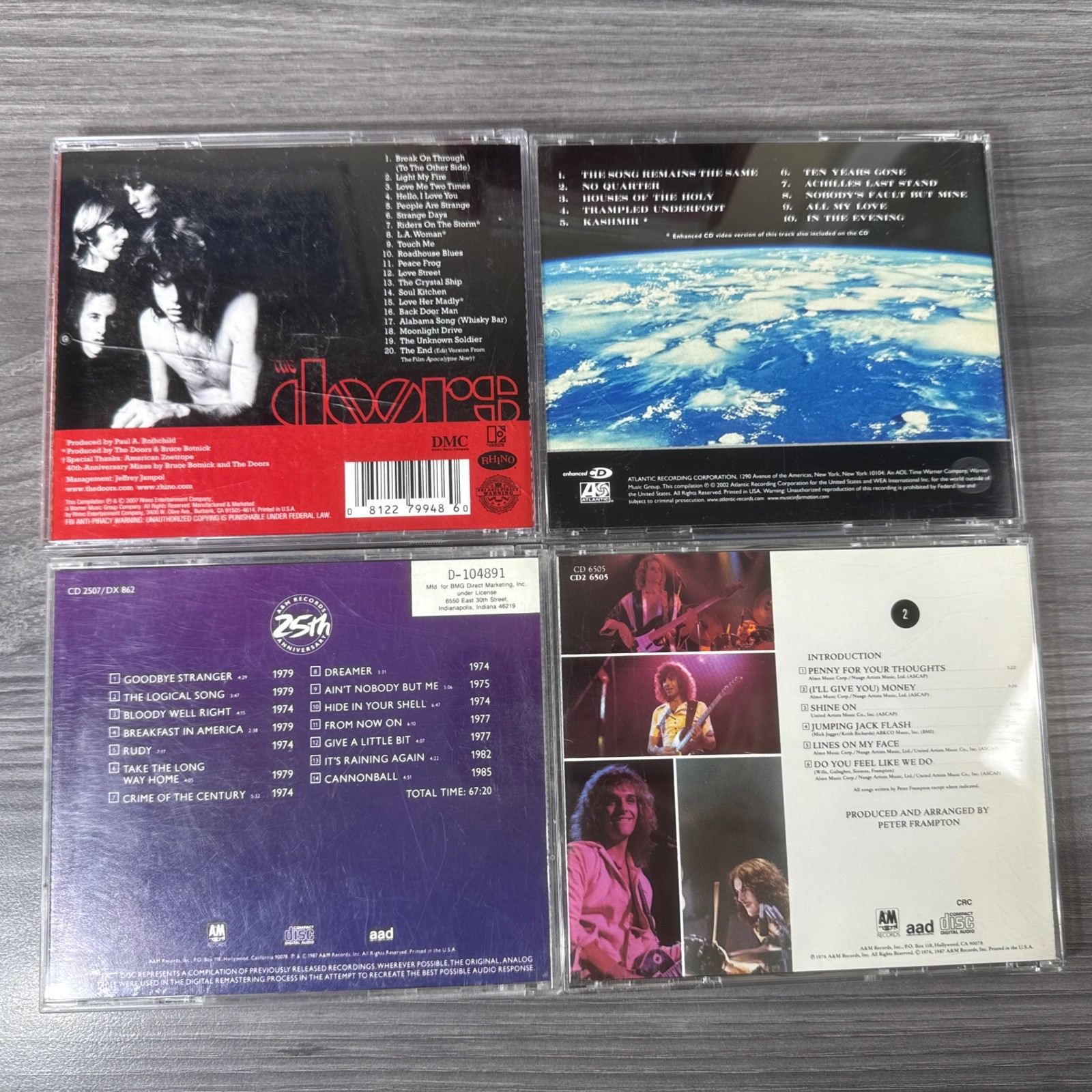 70’s Rock CD Lot of 20 AC/DC Skynyrd Clapton Zeppelin Dylan Stones Etc… W/Stand