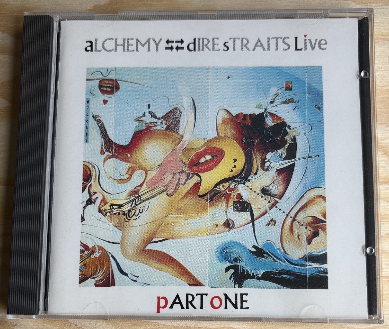 Dire Straits –Alchemy Live (D1)–Vertigo 818 244‑2 West Germany Red Fan Pressing
