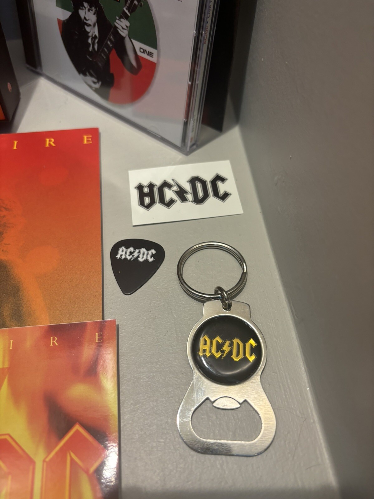 AC/DC "BONFIRE" 4 DISC BOX SET 1997- Sticker/Tattoo/Key Chain /Guitar Pick Rock