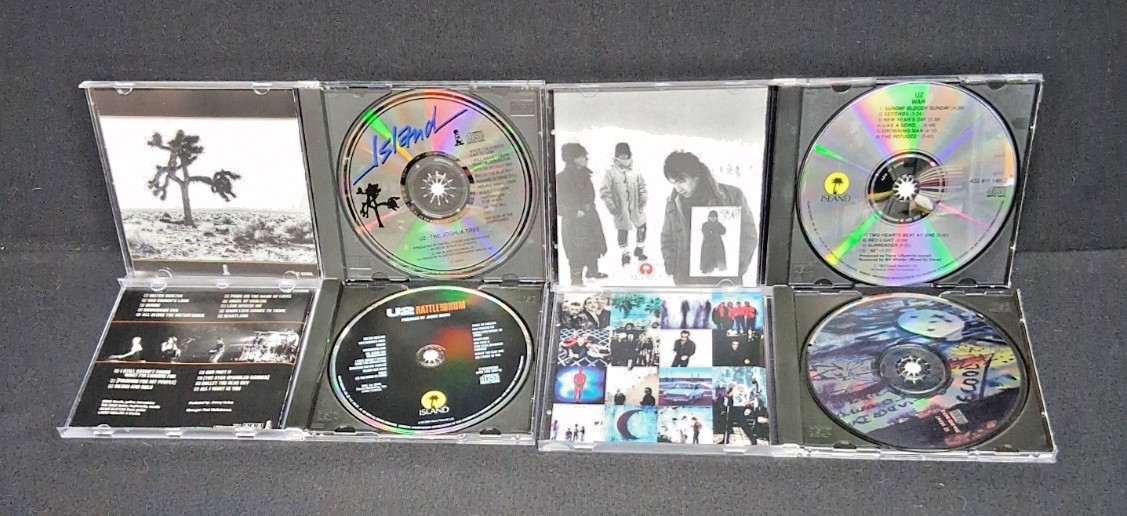 U2 Lot of 4 CDs. Alternate Rock - Rattle and Hum, Acting Baby, War Joshua Tree