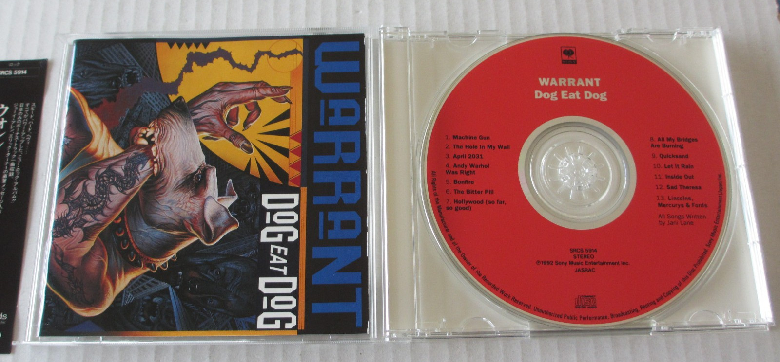 WARRANT- DOG EAT DOG CD JAPANESE PRESS 1992 80s HAIR METAL / GLAM ROCK SRCS-5944