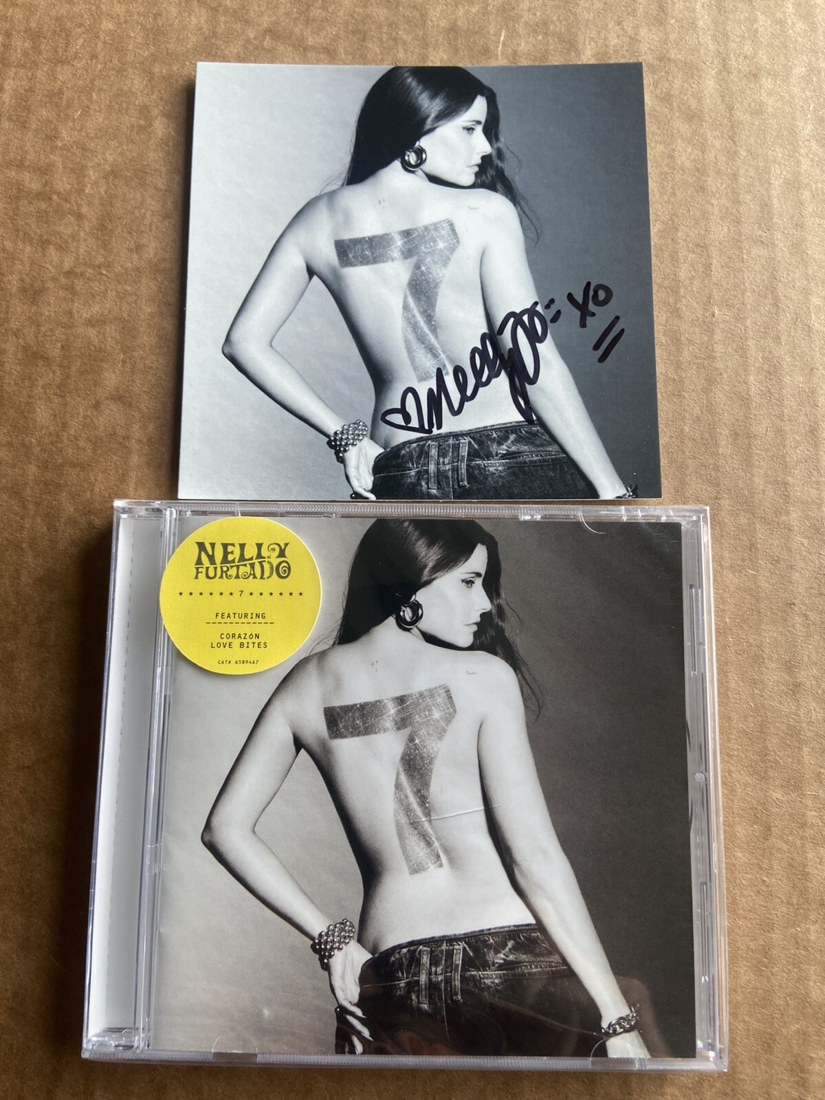 NELLY FURTADO 7 SIGNED CD Autographed Insert Seven