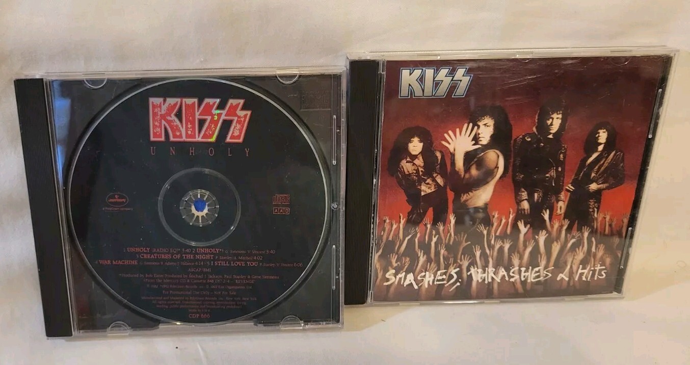 Kiss CD Lot - Smashes, Thrashes & Hits (836 427-2) and Unholy Promo CD (CDP 666)