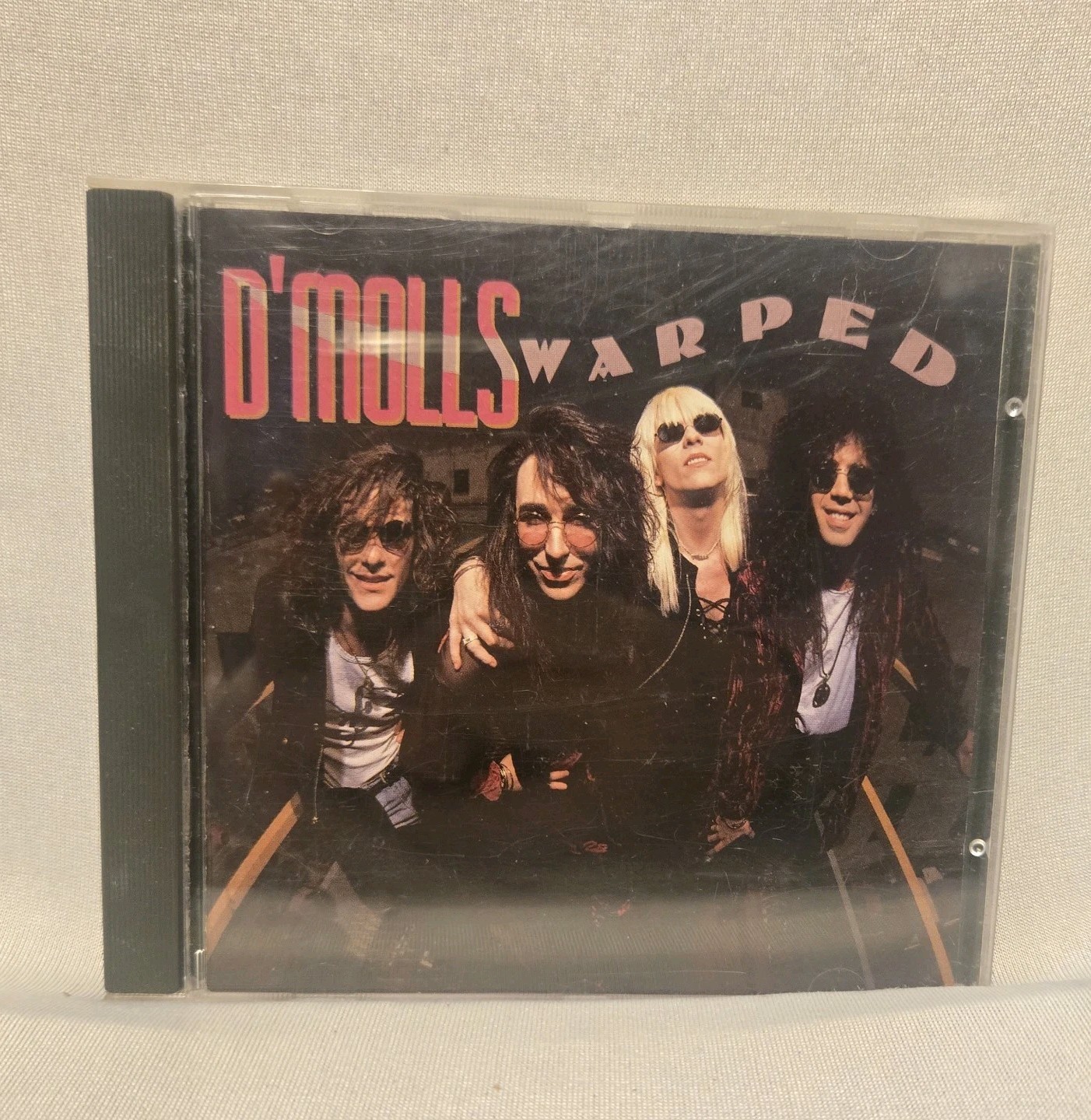 D'Molls-Warped Vintage 1990 CD Atlantic Records Glam Rock-Hair-Metal 82070-2 VG+