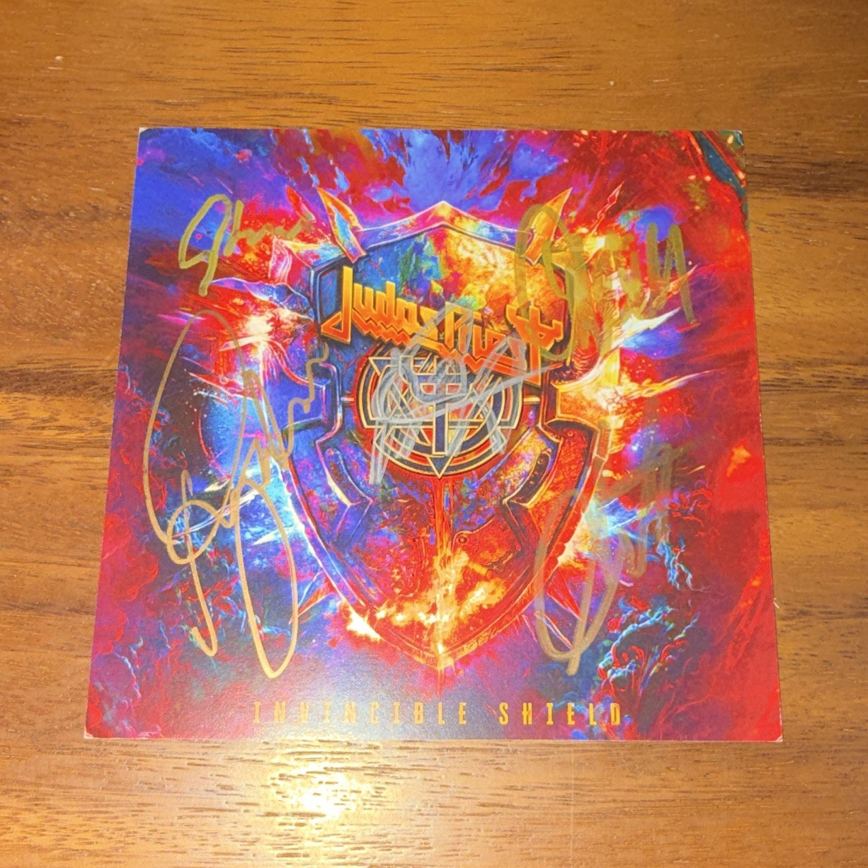Judas Priest Invincible Shield Rock Album CD insert autographed by entire band.