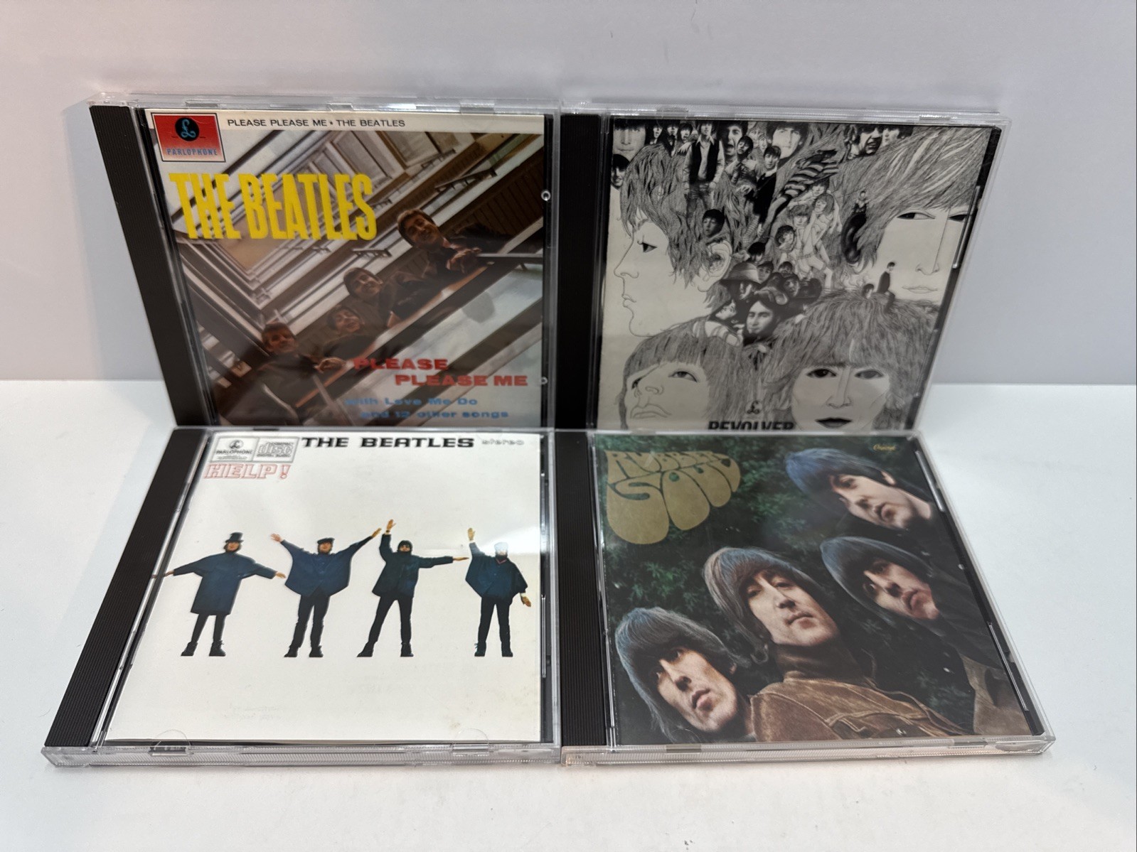 The Beatles Lot of 4 CD’s HELP!, Rubber Soul, Revolver, & Please Please Me