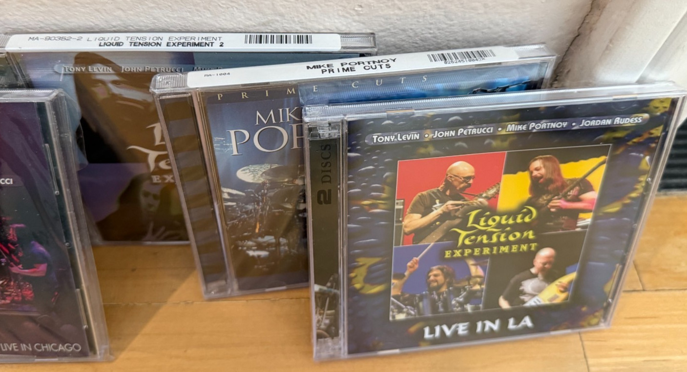 Dream theater and liquid tension experiment CDs