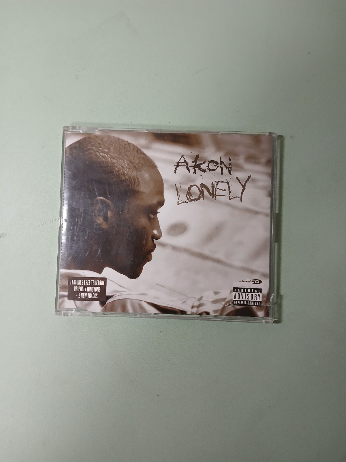 Akon "Lonely" CD single (2005), feat: Kardinal Offishall (cracked Case)